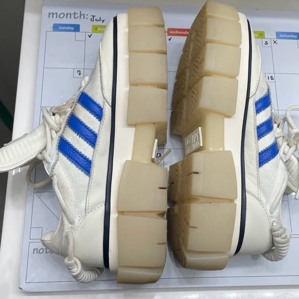 Size 7/5- adidas Ivy Park x Super Super Sleek Rodeo - Glow Blue W